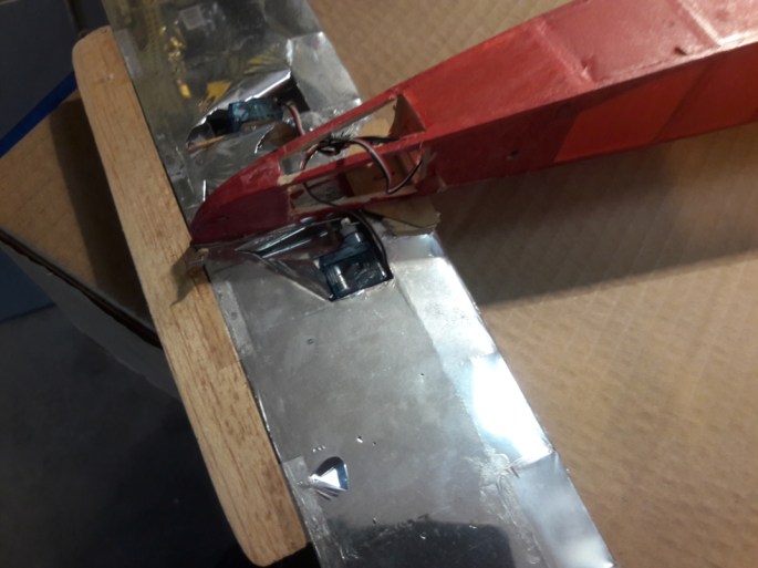 Back in the day it was common to use a light weight silver foil for stabilizers or "stabs" . Scotch tape was used for a very effective temporary hinge material.